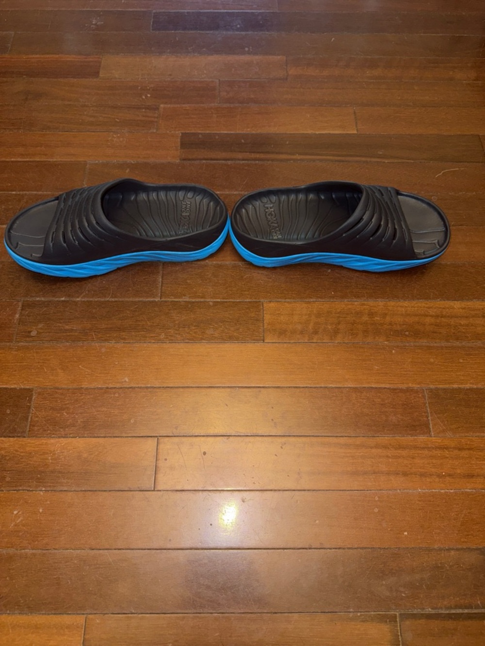 Hoka Men's Black Slide Sandals with Blue Midsoles - Picture 9 of 10